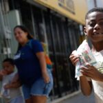 Fé e alegria marcam o dia de Cosme e Damião no Rio de Janeiro