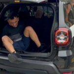 Douglas Alves da Silva, 26, ao chegar na delegacia; ele é suspeito de atropelar Tainara Souza Santos em São Paulo