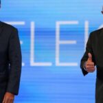 23.out.2026 - Flávio Bolsonaro e Lula antes de começar o debate na Globo