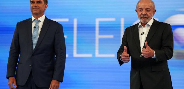 23.out.2026 - Flávio Bolsonaro e Lula antes de começar o debate na Globo